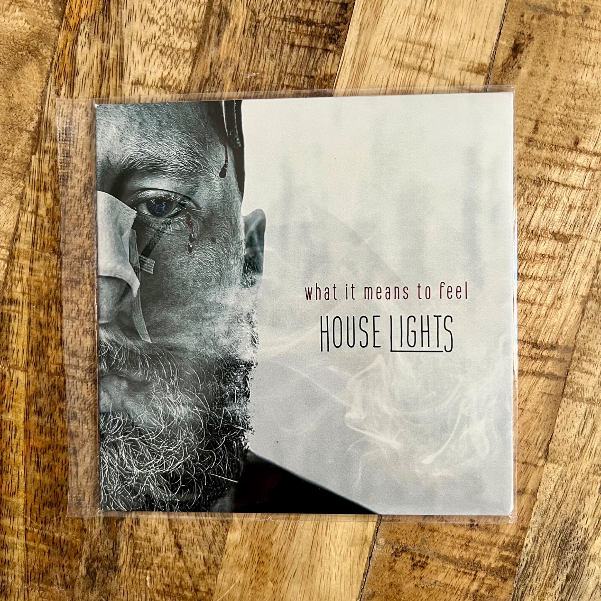 What It Means to Feel CD front flat lay